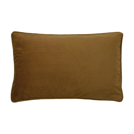 Rectangular gold velvet cushion, plain reverse side shown with piped edging, photographed on a white background.