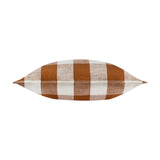 Chesil Check cushion shown lengthwise, showcasing pecan brown and off-white gingham cotton print with flat edge seam, against a plain white background.