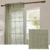 Cirrus sheer curtain panel in eucalyptus green polyester with slubbed cross-hatch weave, hidden tab top header on wooden pole beside a window, plus fabric swatch.