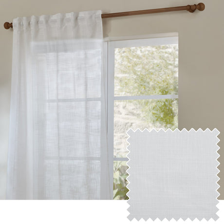 Cirrus Plain Polyester Curtain Panel in snow white sheer fabric with tab-top heading, hung on a wooden rod beside a window, with a fabric swatch inset.