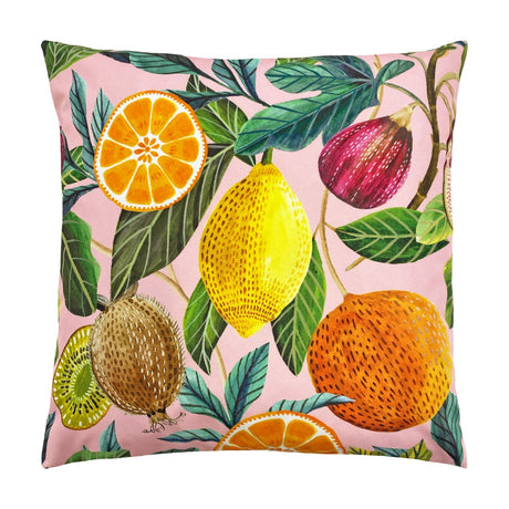 Square polyester cushion in the Citrus Abstract print, showing a halved orange, whole lemon, stippled orange, fig and kiwi slice among green leaves on a pink ground.