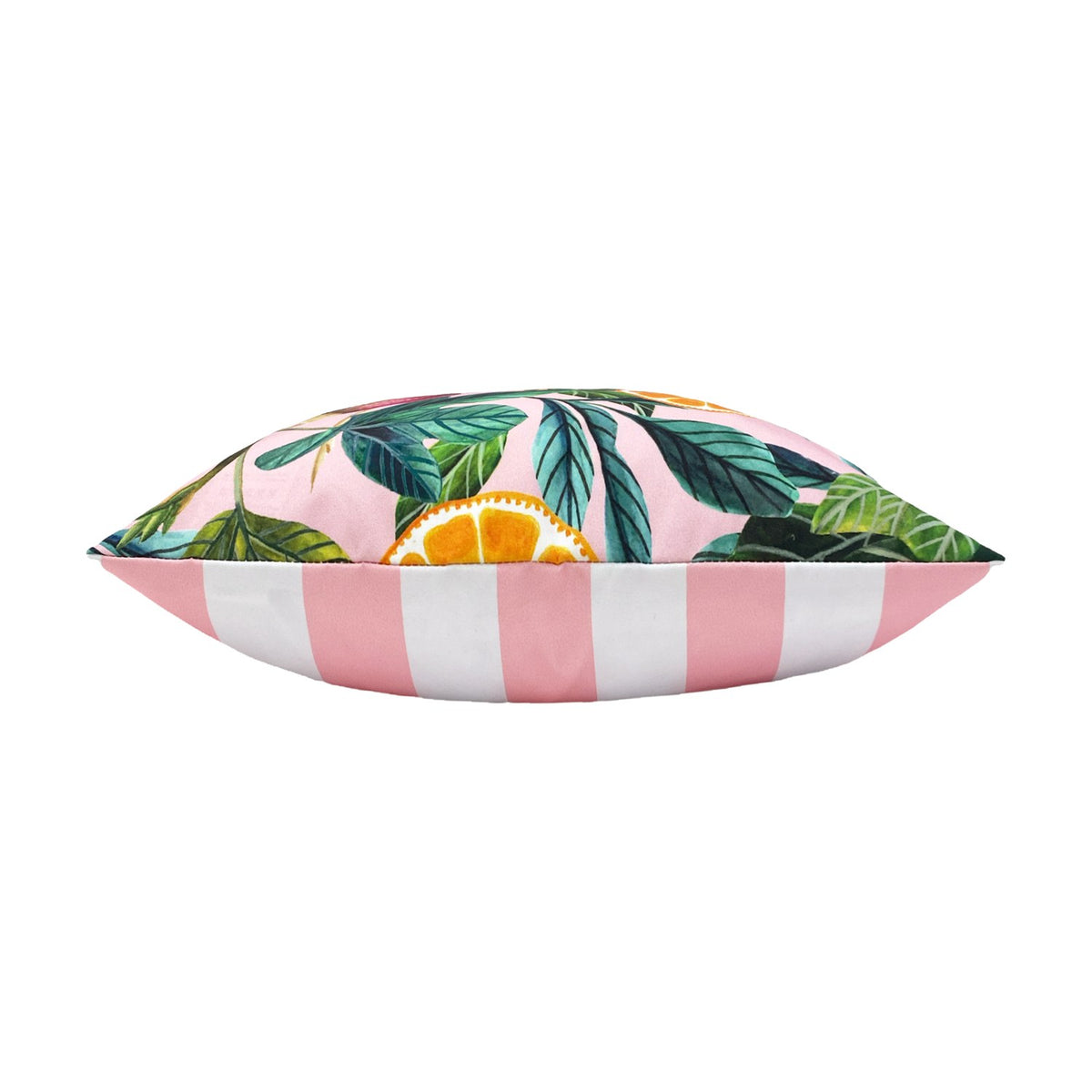 Side view of the Citrus Abstract Polyester Cushion showing citrus fruit and green foliage print on pink, with a coordinating pink and white striped reverse edge, on a plain white background.