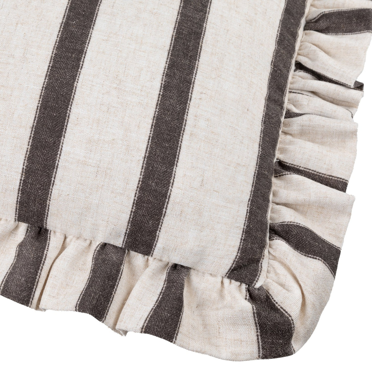 Close-up corner of the Connie striped linen cushion in chocolate, showing cream fabric with brown stripes and a gathered ruffle edge.