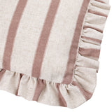 Close-up of the Connie Striped Linen Cushion in clay pink, showing woven stripes on a natural oatmeal ground with a gathered ruffle trim along the edge.