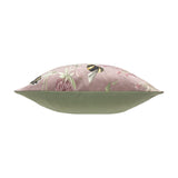 Side view of the Country Animal Velvet Cushion in Heather, showing heather-pink velvet with a bumblebee and floral print on one side and a plain sage green velvet reverse, on a white background.