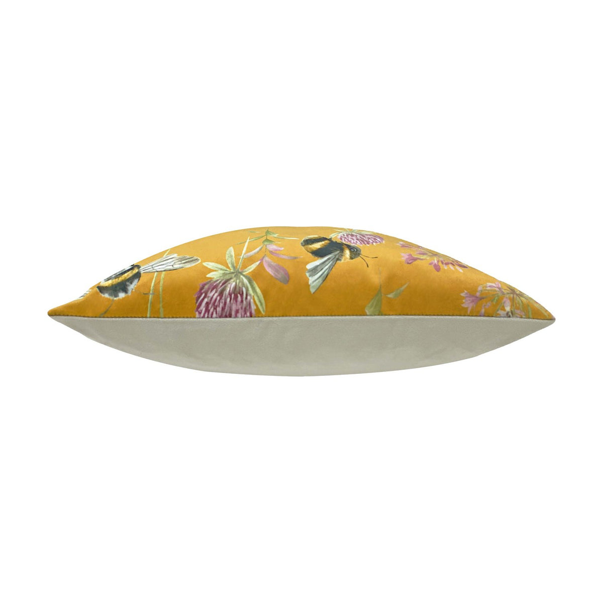 Side view of the Country Animal Velvet Cushion in honey yellow, showing its plump velvet shape with bee and floral print on the front and a plain cream back, set against a white background.