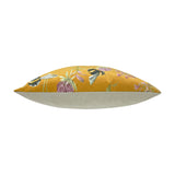 Side view of the Country Animal Velvet Cushion in honey yellow, showing its plump velvet shape with bee and floral print on the front and a plain cream back, set against a white background.