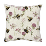 Square 43 x 43cm linen-look cushion printed with bumblebees in flight among pink clover heads and green flowering stems on a cream ground, shown against a plain white background.