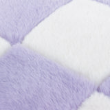 Close-up of the Cozee Check faux fur cushion in lilac and white, showing the checkerboard pattern and dense polyester pile texture.