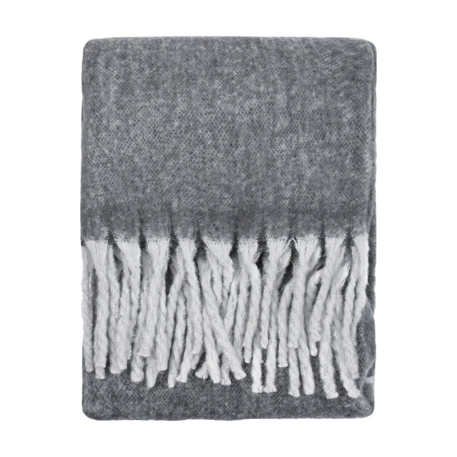 Cosy Plain Polyester Throw in charcoal grey, folded flat with a deep white tasselled fringe along the short ends, shown on a plain white background.