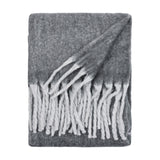 Cosy Plain Polyester Throw in charcoal grey, folded to show its woven texture and deep white tasselled fringe, shot against a plain white background.