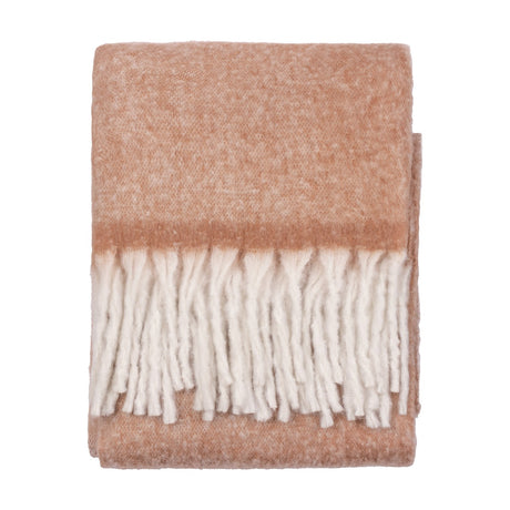 Cosy Plain Polyester Throw in rust, folded to show a woven texture with cream knotted fringe tassels, set against a plain white background.