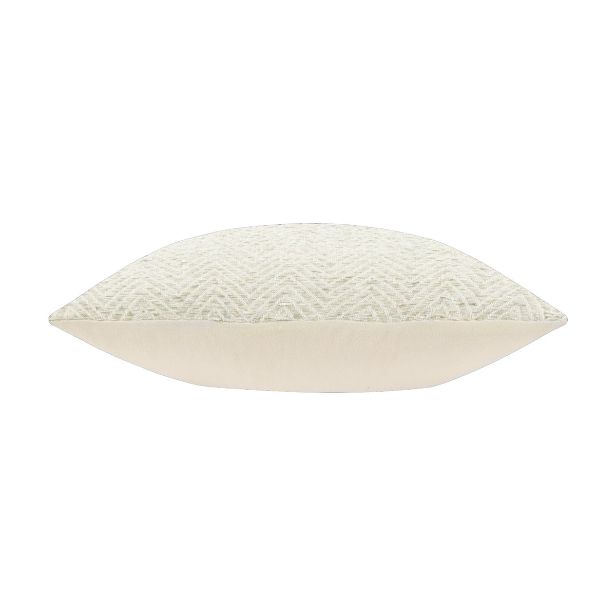 Side view of the Croft Plain Velvet Cushion in natural, showing a chevron twill front in cream and beige tones against a plain velvet reverse, on a white background.