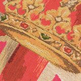 Close-up of the Crown Union Jack Plain Cotton Cushion in pink, showing woven cotton fabric with a gold crown motif and coral, pink and cream tones.