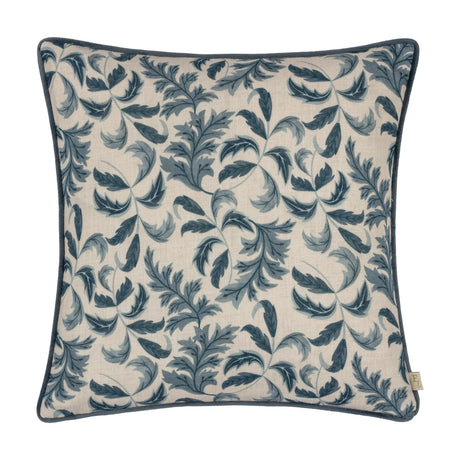 Chatsworth Topiary Velvet Linen Cushion in Petrol, square with piped edges, cream linen front printed with petrol blue leaf fronds, shown on a plain white background.