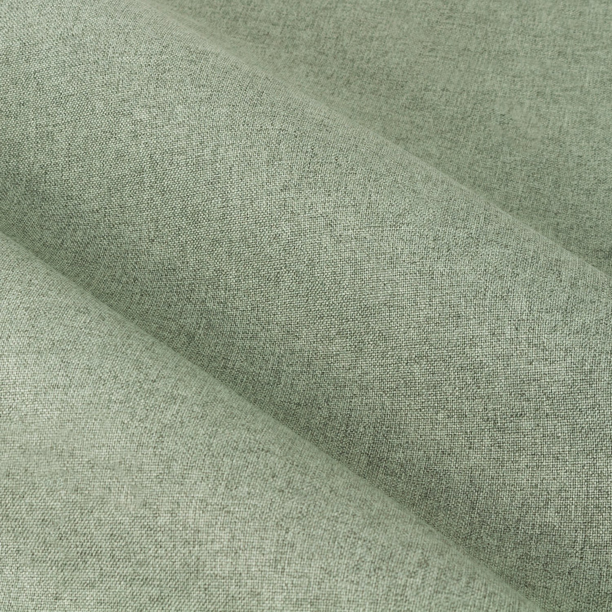 Close-up of Dawn Plain Reversible Eyelet Curtains in eucalyptus, showing soft-textured polyester fabric with a subtle marl weave and draped fold.