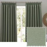 Dawn Reversible Pencil Pleat Curtains in eucalyptus green, full-length panels on a metal pole in a living room, with a fabric swatch showing the textured marl weave.