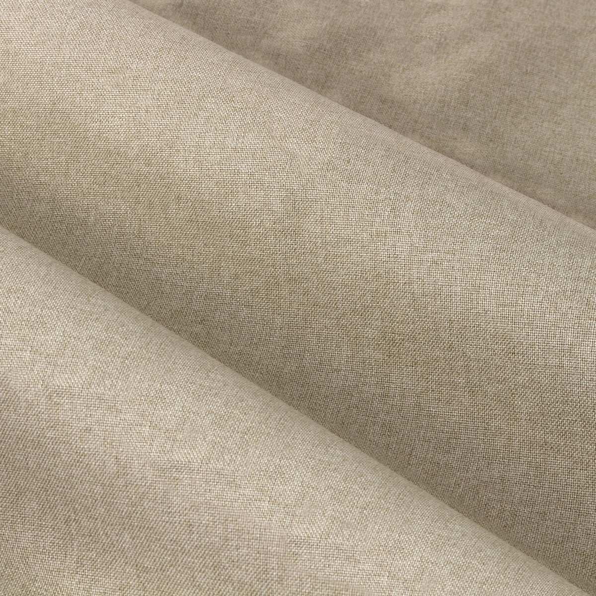 Close-up of Dawn pencil pleat curtain fabric in natural oatmeal-beige polyester, showing a soft marl-effect woven texture with folds.