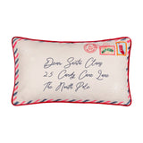 Rectangular Dear Santa cushion in cream cotton-velvet, styled as an airmail letter with red, pink and navy diagonal border, postmarks and stamp prints, on a white background.