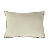 Delano Jacquard Velvet Cushion in ivory, rectangular with plain velvet face and piped edges, patterned trim peeking at the base, shown on a white background.