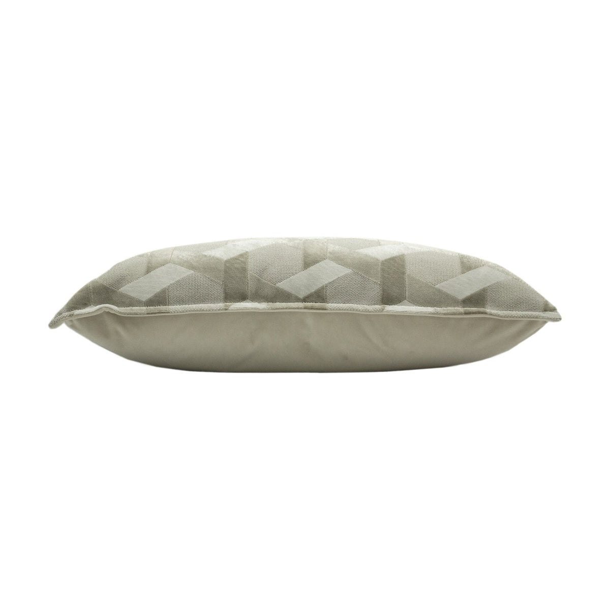 Side view of the Delano Jacquard Velvet Cushion in ivory/taupe, showing a plain reverse panel and a jacquard chevron-diamond patterned edge, set against a white background.