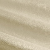 Close-up of The Ultimate Velvet Plain Lined Eyelet Curtains in natural, showing the soft matt velvet-faced fabric with gentle folds.