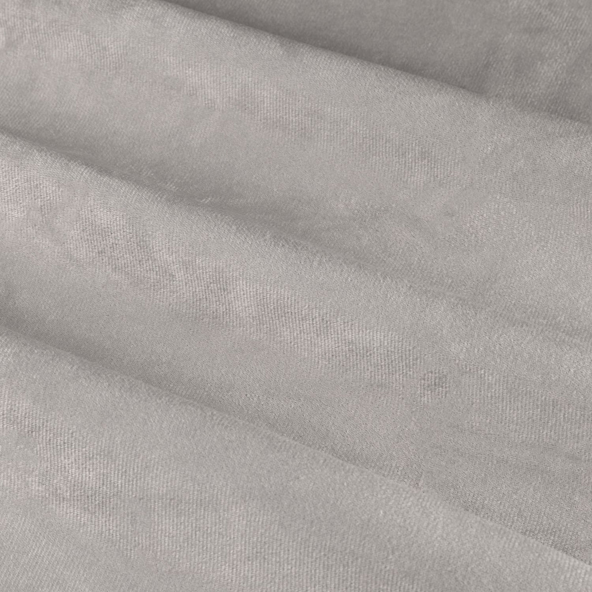 Close-up of The Ultimate Velvet Plain Lined Eyelet Curtains in Silver, showing soft folds of matte grey velvet fabric with a subtle woven texture.