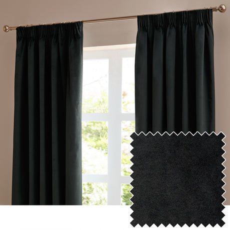 Black velvet pencil pleat blackout curtains with gathered header tape, hung on a brass-effect pole beside a window, with a fabric swatch shown inset.