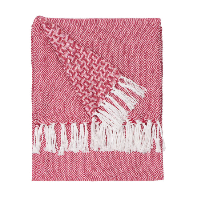 Dessa Geometric Polyester Throw in fuchsia, folded flat with a small diamond pattern on a pink-red ground and knotted off-white fringe, shown on a white background.