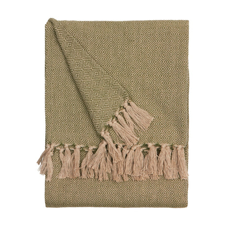 Dessa Geometric Polyester Throw in olive, folded to show a diamond lattice weave and knotted tassel fringe, on a plain white background.