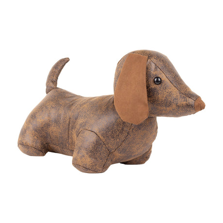 Dexter Animal Polyester Door Stop in Brown, a dachshund-shaped design with mottled faux leather body, tan faux suede ears, pointed muzzle and beaded eyes, shown on a plain white background.