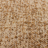 Close-up of the Doze Reversible Cotton Cushion in Biscuit, showing a space-dyed woven texture blending beige, toffee and golden-brown flecks.