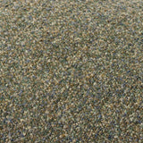 Close-up of the Doze Reversible Cotton Cushion in Moss, showing a flecked, space-dyed woven texture blending green, tan and blue-grey tones.