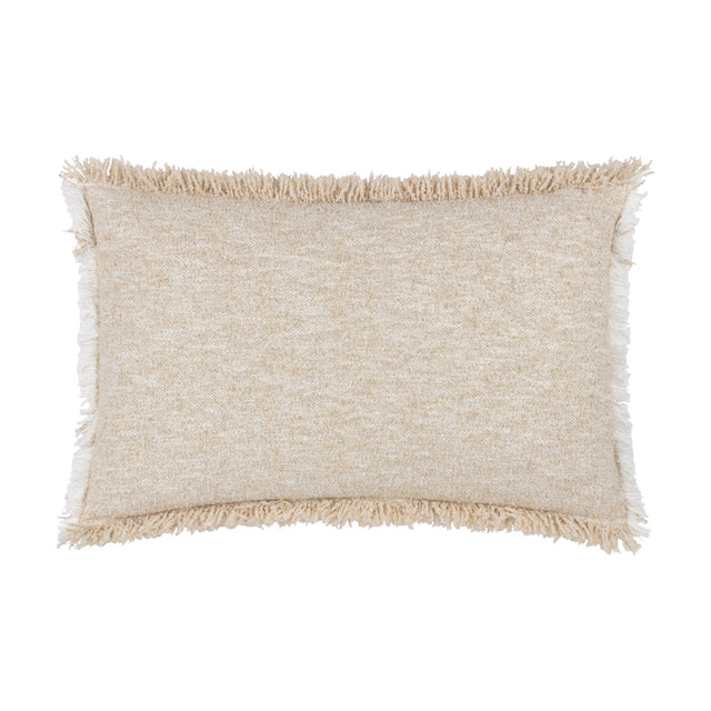 Doze Reversible Cotton Cushion in natural, a rectangular bolster with a textured, space-dyed weave in cream and sandy beige, finished with raw fringed edges, on a plain white background.