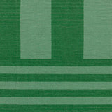 Deck Stripe Printed Polyester Rug in green, close-up of the flatweave design showing broad vertical bars shifting into narrower horizontal stripes.
