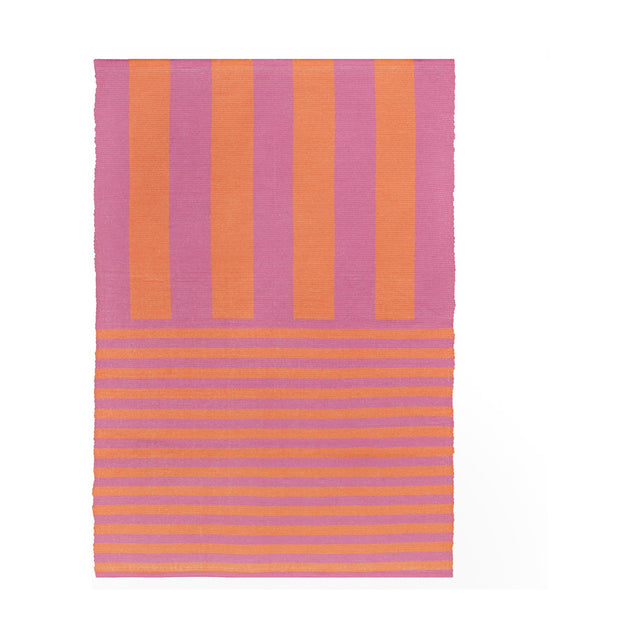 Deck Stripe Printed Polyester Rug in orange and pink, flatweave with broad vertical stripes on top and narrower horizontal stripes below, shown on a plain white background.