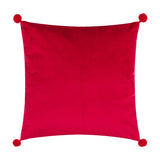 Deck The Halls square velvet cushion shown in plain red with pom-pom corner tassels, photographed against a plain white background.