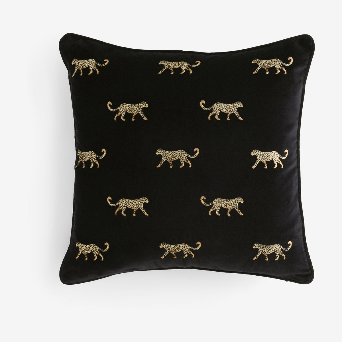 Duma Velvet Cotton Cushion in noir, a square black velvet cushion with embroidered gold cheetahs in a repeating pattern, shown on a plain white background.