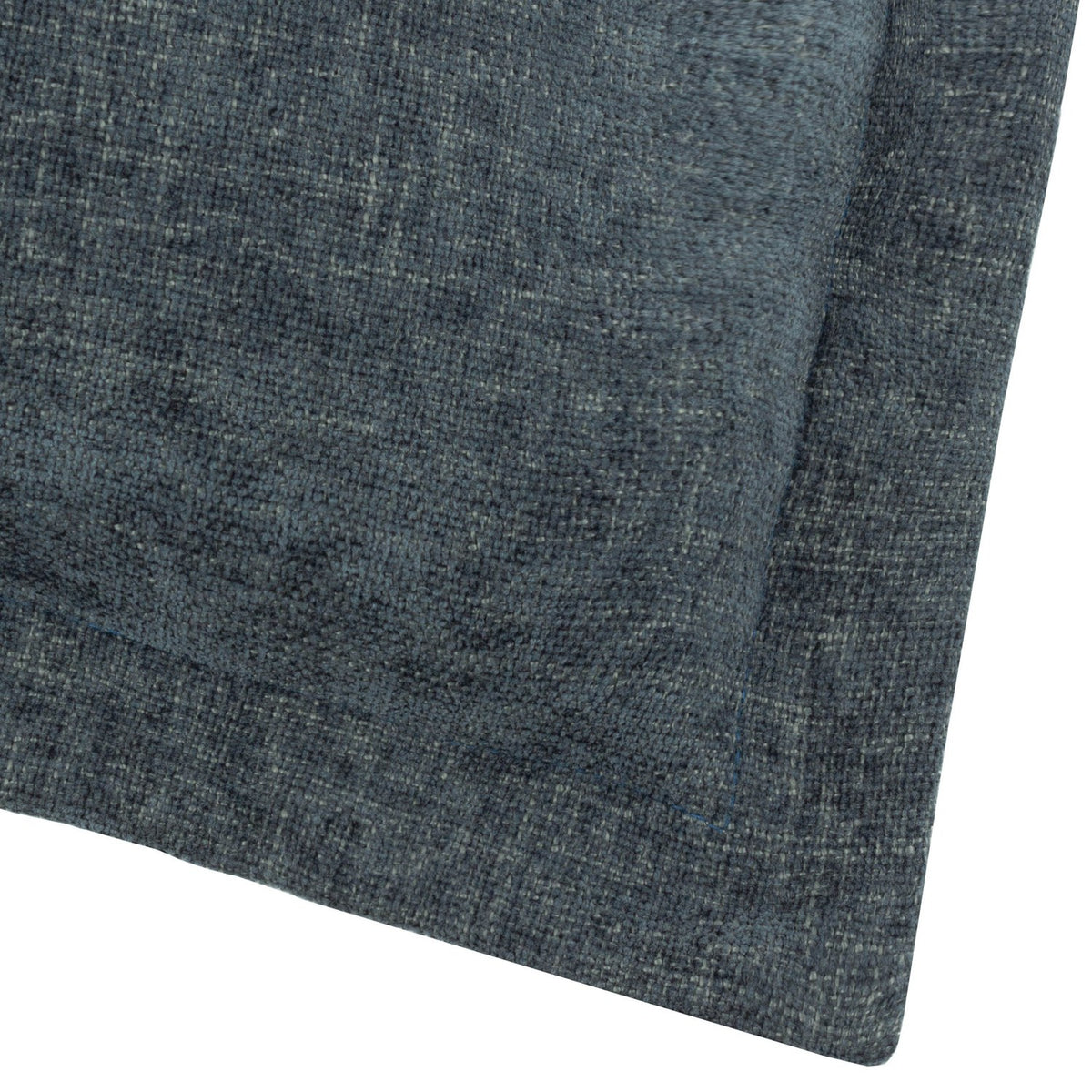 Close-up of the Dune Velvet Chenille Cushion in Slate, showing the textured blue-grey fabric weave and a neatly folded seam edge.