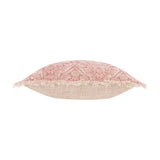 Durelle Damask Cotton Cushion in coral, side view showing the fringed edge, coral-pink damask pattern on cream cotton, and plain beige reverse, set against a white background.