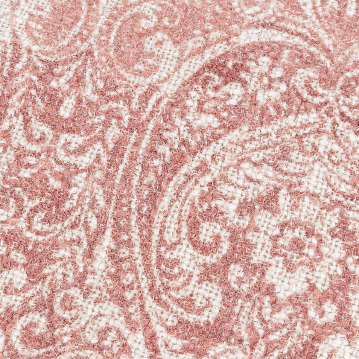 Close-up of the Durelle Damask Cotton Cushion in coral, showing a scrolling foliate damask pattern in coral-pink on a cream slub cotton ground.