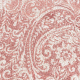 Close-up of the Durelle Damask Cotton Cushion in coral, showing a scrolling foliate damask pattern in coral-pink on a cream slub cotton ground.