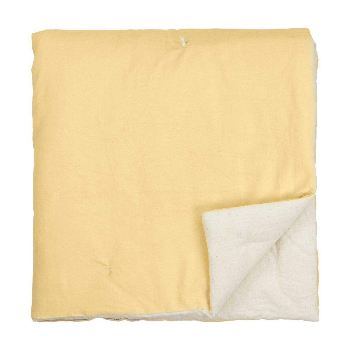 Edie Linen Cotton Bedspread in butter yellow, quilted velvet folded to reveal a pale natural linen-look reverse, shown on a plain white background.