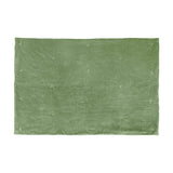 Edie Linen Cotton Bedspread in green, shown flat with a quilted cotton velvet face and small hand-tied thread details, set against a plain white background.