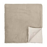 Edie Linen Cotton Bedspread in natural, folded to show soft velvet-finish top and linen-look cotton reverse, on a plain white background.