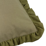 Close-up of the Effie Plain Cotton Cushion in sage green, showing the slub cotton texture and gathered ruffle trim edge on a white background.