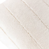 Close-up of the Empress Velvet Faux Fur Cushion in cream, showing soft long-pile fabric with channelled vertical stripes.