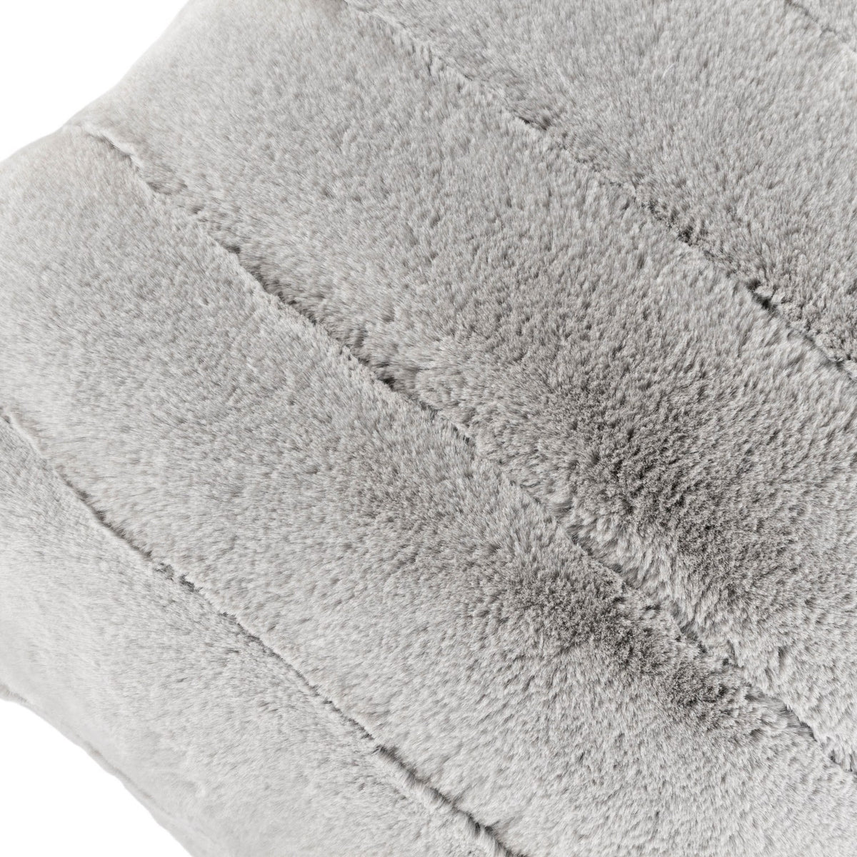 Close-up of the Empress Velvet Faux Fur Cushion in grey, showing dense polyester pile divided into channelled vertical panel seams.