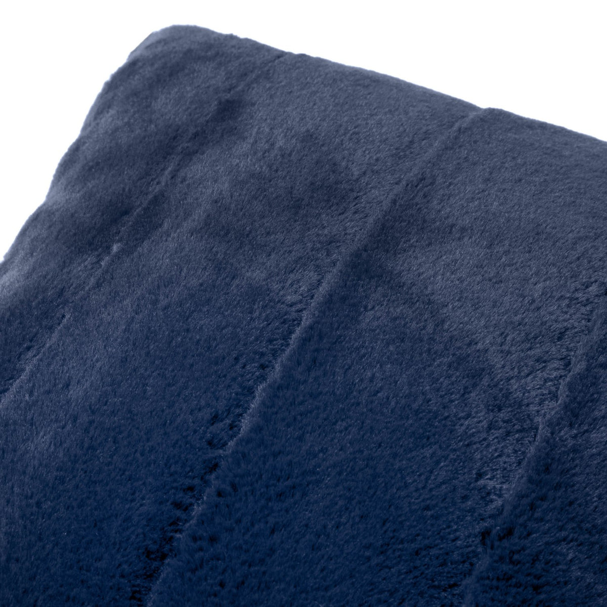 Close-up of the Empress Velvet Faux Fur Cushion in navy, showing deep pile fabric with soft vertical channels, on a plain white background.