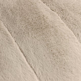 Close-up of the Empress Plain Faux Fur Cushion in oatmeal, showing deep plush pile with vertical ribbed channels across the surface.
